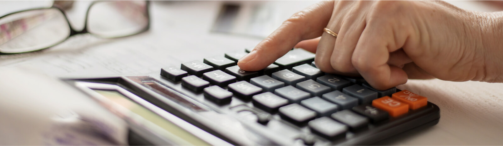 hands on a calculator
